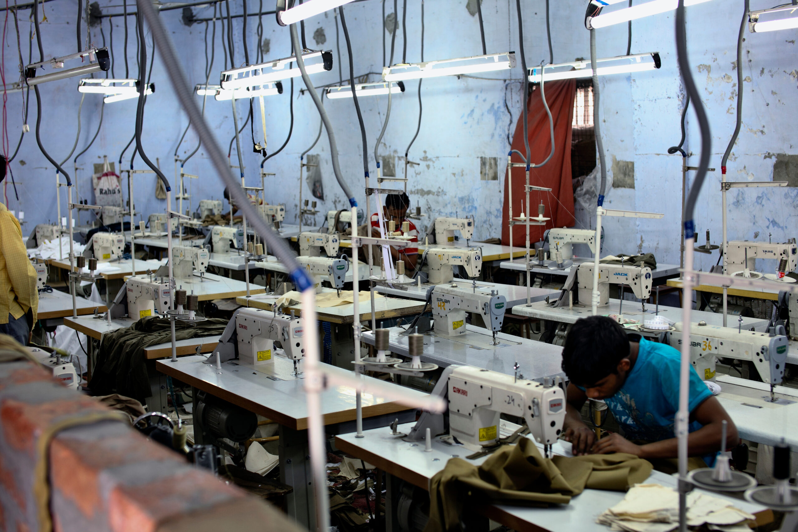 Unidentified,Tailors,Sewing,Garments,In,A,Factory,Near,Ludhiana,,Punjab,