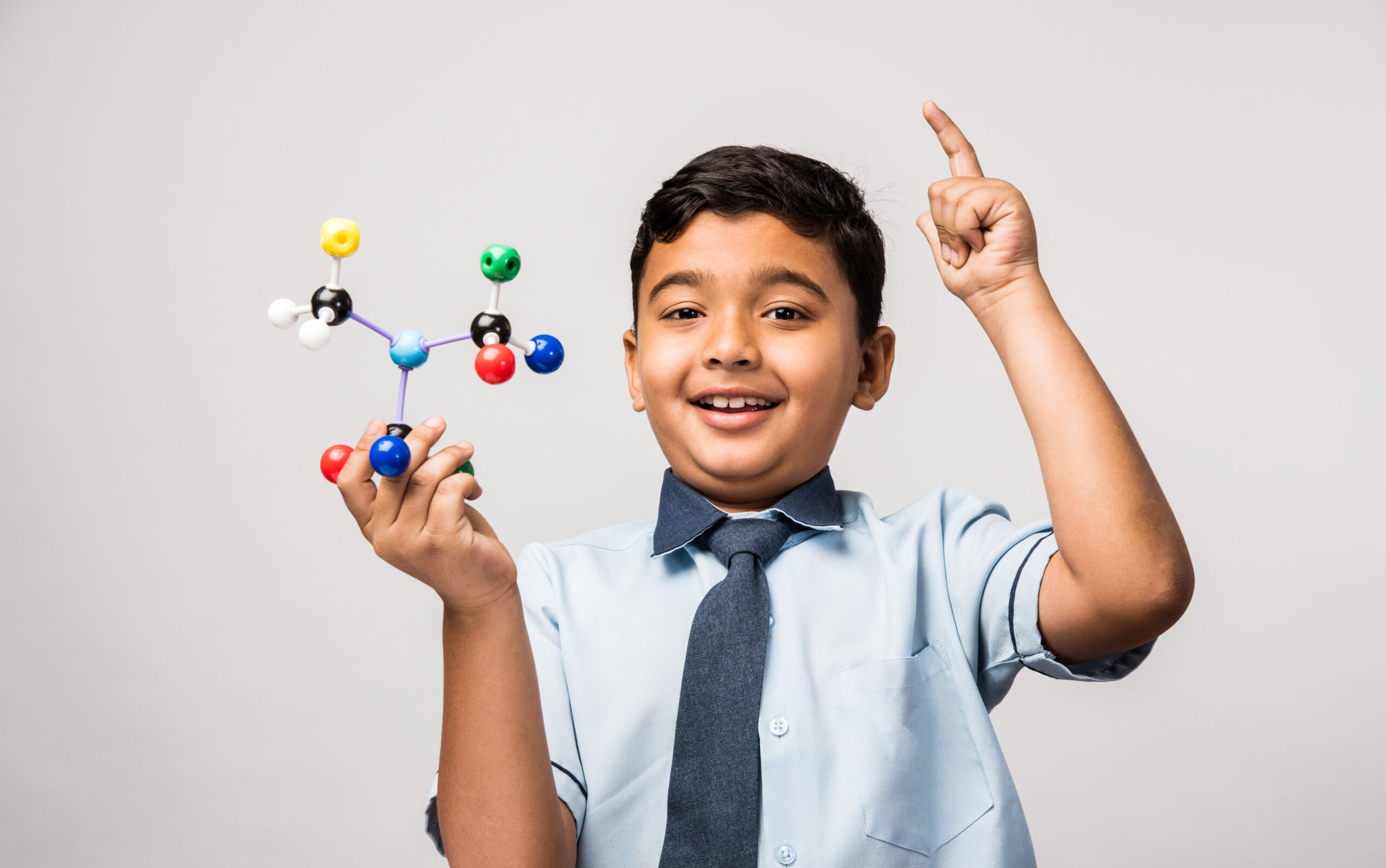 Indian,School,Kid,Or,Science,Student,Using,Molecular,Model,Kit